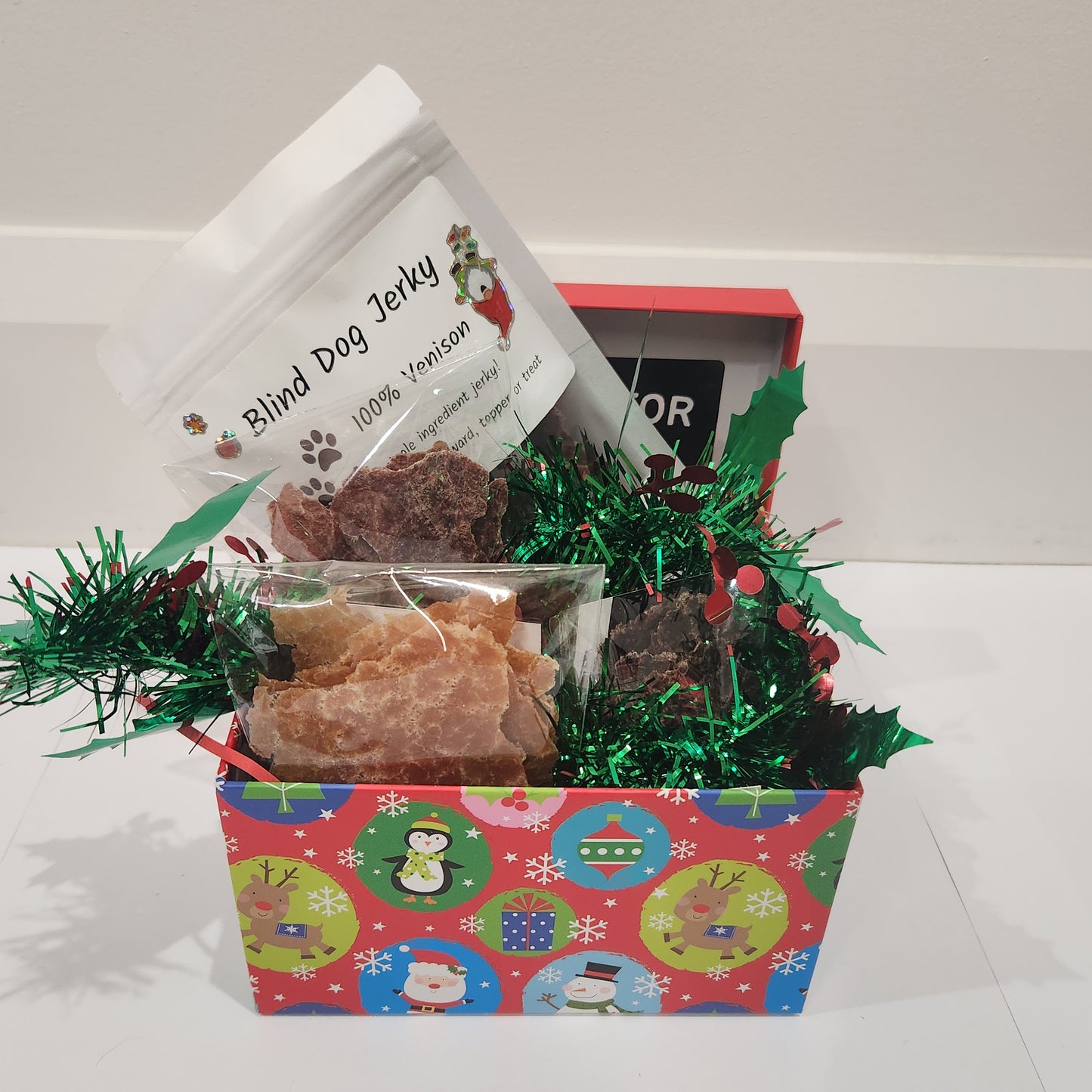 Christmas Box full of Blind Dog Jerky Products